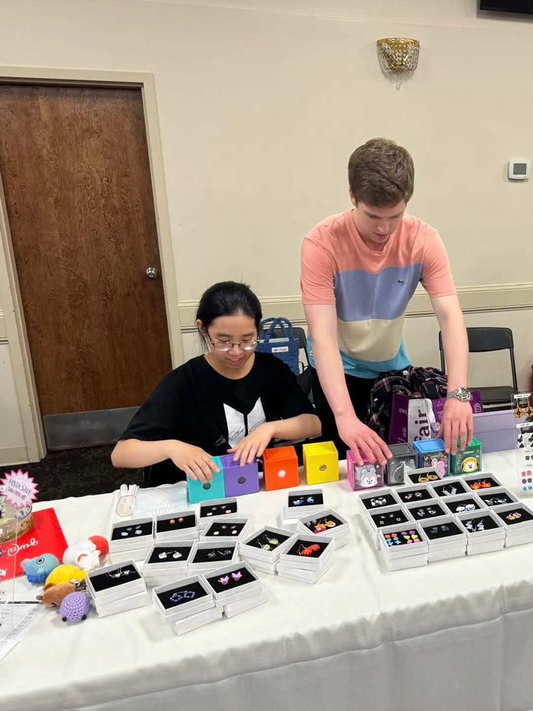 Michael and his fiancée selling handmade goods at a craft fair